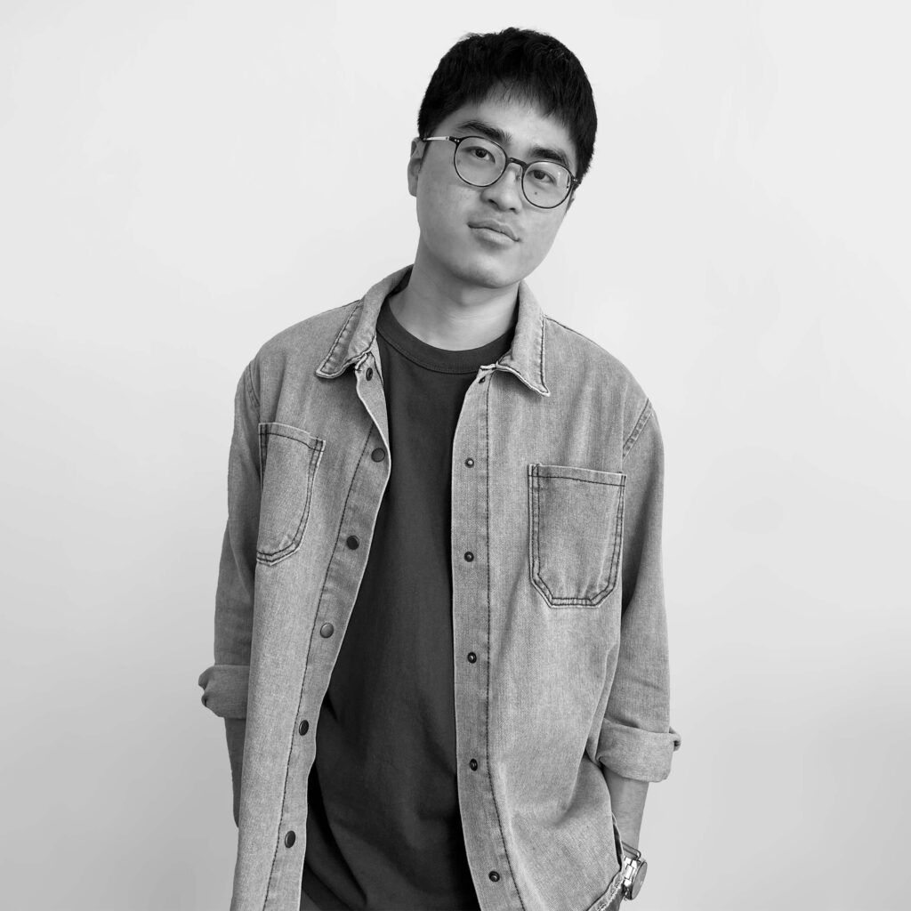 Black and white headshot of Alan Tsai, junior designer at Pilotfish